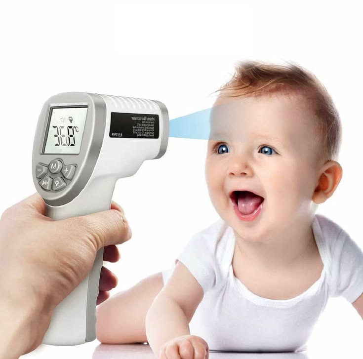 Baby being measured with a digital thermometer on a white background

