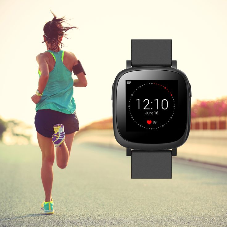 Smartwatch displayed with a runner in the background